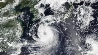 Alert of record breaking rain in Japan, threat of typhoon looming