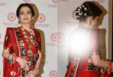 Nita Ambani wearing a red color belt and a special blouse.