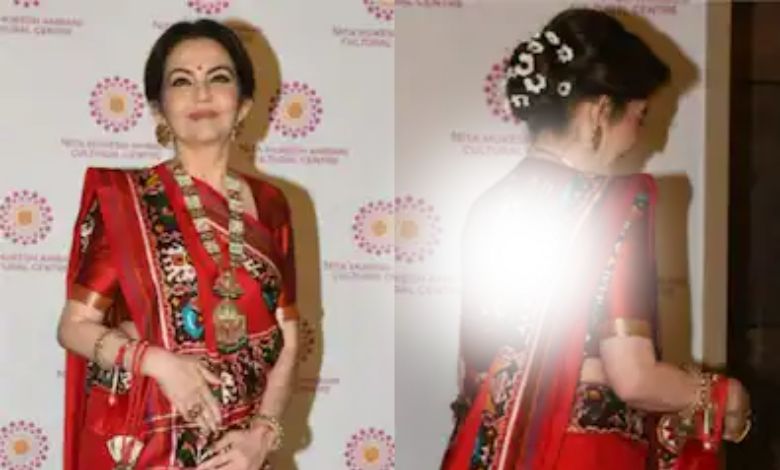 Nita Ambani wearing a red color belt and a special blouse.