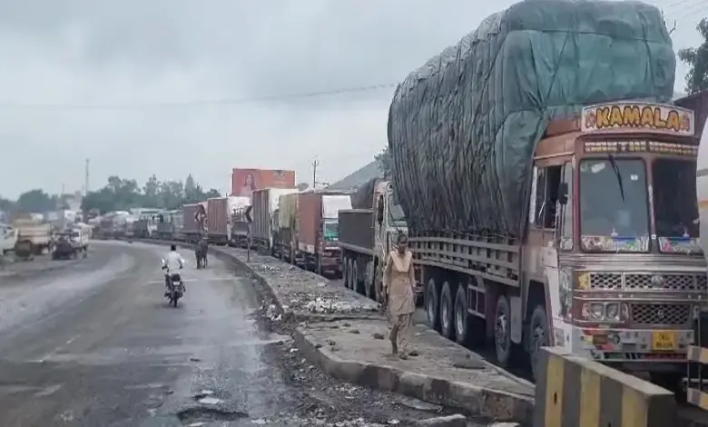 Traffic jam connected  Chotila National Highway owed  to potholes