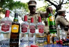 "image of police personnel in ahmedabad facing legal action for alcohol consumption"