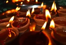 "lighting lamps during diwali"