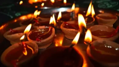 "lighting lamps during diwali"