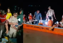 rescue teams evacuating people from flooded bhadrak village