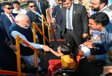 pm modi and spanish president pedro sanchez waving at crowd during vadodara roadshow ¹