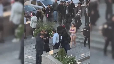 Student takes off her clothes in Iran University