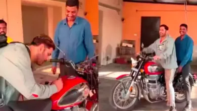 ms dhoni rides fan's royal enfield bike after signing autograph