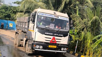 "BMC workers collecting debris as part of free pickup service in Mumbai"