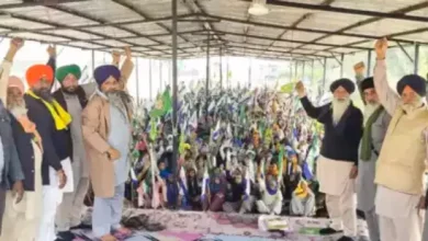 Farmers gathered during a protest, awaiting the government's response