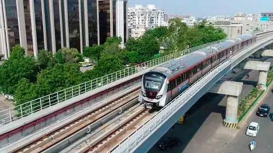 Ahmedabad metro train arriving at Thaltej village station