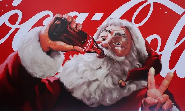 Are Santa Clause's red and white clothes a gift from this famous cold drink company?