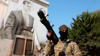 "Rebel forces celebrating in Damascus after capturing the city."