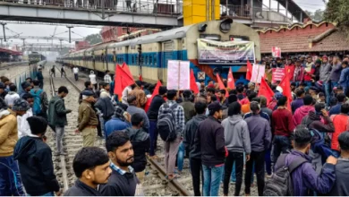 Protestors blocking a railway track in Bihar