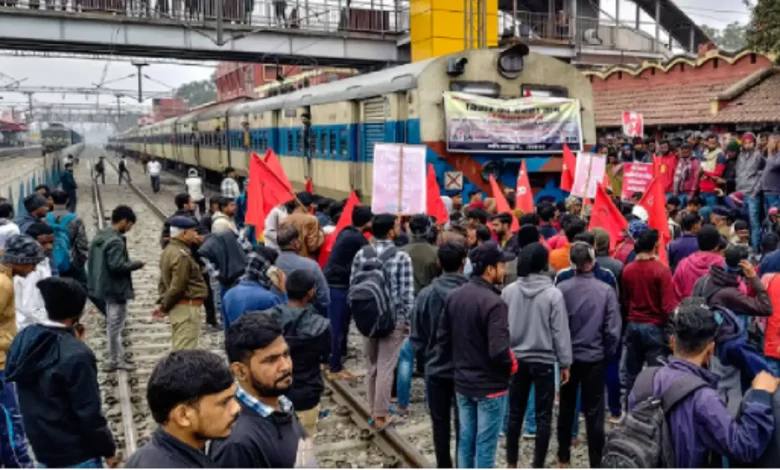 Protestors blocking a railway track in Bihar