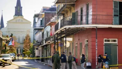 Bourbon Street in New Orleans, scene of recent attack. (Or: Police investigation on Bourbon Street after deadly rampage.)