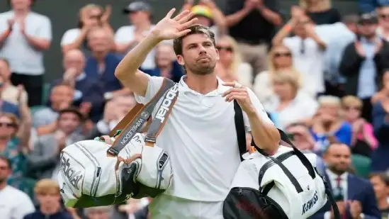 Cameron Norrie's racket slips and hits a spectator at the Auckland Open.