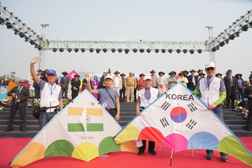  Colorful kites flying in the sky during the International Kite Festival in Ahmedabad