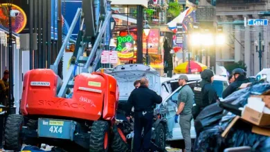 : Aftermath of truck crash at New Orleans New Year's Eve celebration. (Or, if a less graphic image: Police and emergency services at the scene of the New Orleans NYE truck accident.)