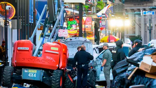 : Aftermath of truck crash at New Orleans New Year's Eve celebration. (Or, if a less graphic image: Police and emergency services at the scene of the New Orleans NYE truck accident.)