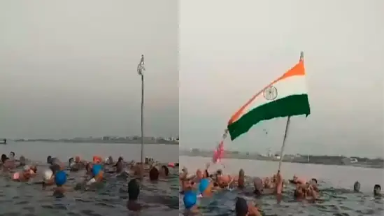 swimming nine  members hoist tricolor successful  oversea  porbandar