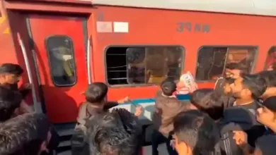 Passengers vandalizing train coach at Surat railway station