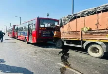 two-foremen-repairing-amts-bus-die