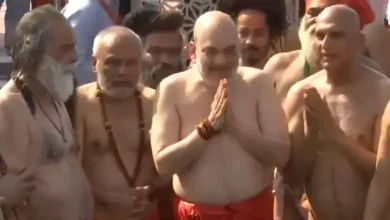 Amit Shah takes holy dip in Triveni Sangam At Maha Kumbh 2025 (Screengrab) | X/ANI