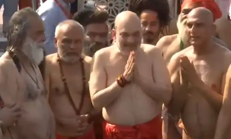 Amit Shah takes holy dip in Triveni Sangam At Maha Kumbh 2025 (Screengrab) | X/ANI