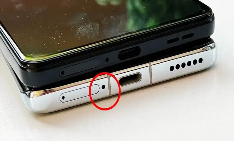 Why do smartphones have a small hole