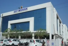 "GST department officials conducting raid in Gandhidham, Kutch, uncovering tax documents"