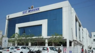 "GST department officials conducting raid in Gandhidham, Kutch, uncovering tax documents"