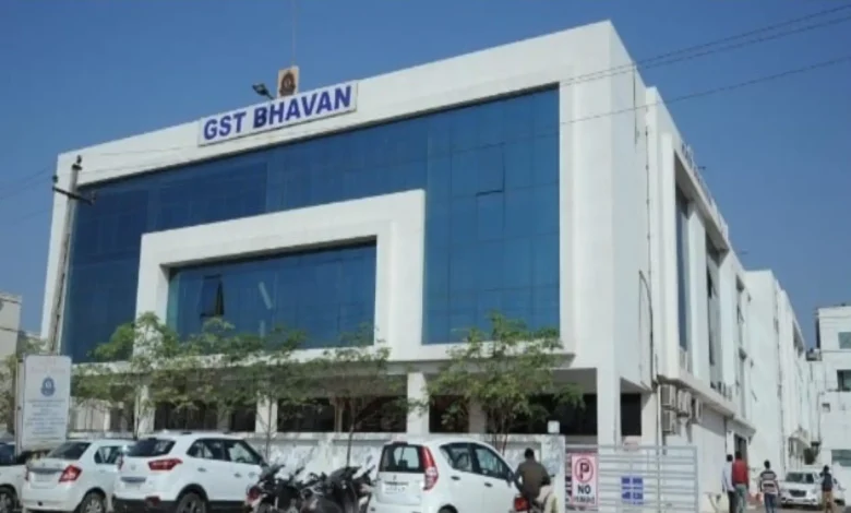 "GST department officials conducting raid in Gandhidham, Kutch, uncovering tax documents"