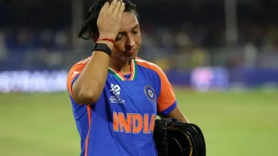 "Harmanpreet Kaur celebrating after reaching 8,000 T20 runs in a historic cricket milestone."