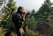 Indian Army soldiers monitoring LoC in Poonch sector after reported small arms fire from Pakistani troops.