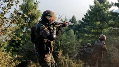 Indian Army soldiers monitoring LoC in Poonch sector after reported small arms fire from Pakistani troops.