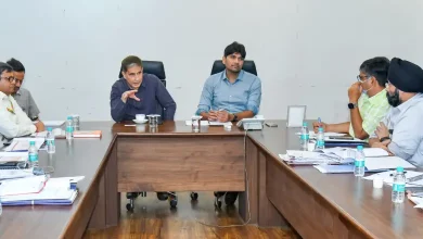 Municipality and railway officials inspecting train stations during monsoon season