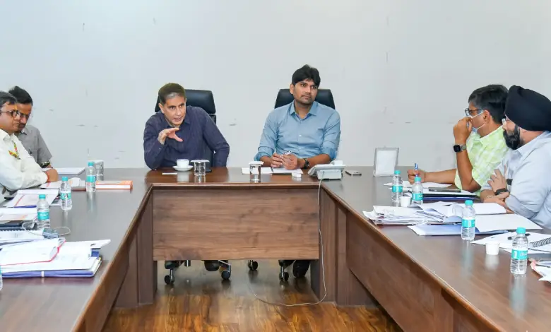 Municipality and railway officials inspecting train stations during monsoon season