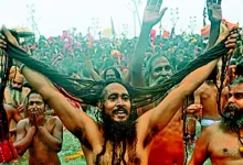 Devotees at a distance from Kumbh Mela, expressing longing and spiritual pain.