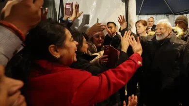 "PM Narendra Modi engaging with Tulsi Gabbard during his US visit, captured live at an official event."