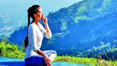 A person practicing pranayama in a serene environment, showcasing the health benefits of controlled breathing.