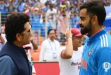 Sachin Tendulkar and Virat Kohli railway station signage at Indian railway station.