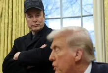 US President Donald Trump reacting at a press event discussing Elon Musk’s plan for a Tesla factory in India.