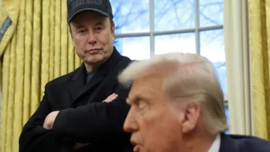 US President Donald Trump reacting at a press event discussing Elon Musk’s plan for a Tesla factory in India.