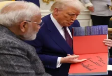 "Trump handing a special gift to Modi with a note saying 'Mr Prime Minister, you are great' at a public event."