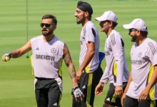 Virat Kohli arrives at Nagpur stadium for ODI match against England, carrying cricket gear.