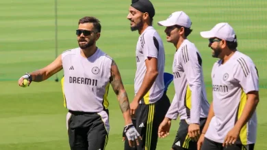 Virat Kohli arrives at Nagpur stadium for ODI match against England, carrying cricket gear.