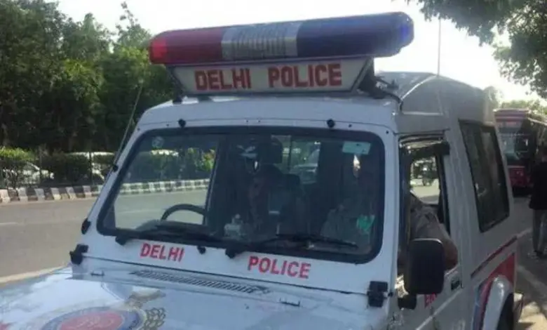 Police at the scene of firing incident in Delhi where five people were injured