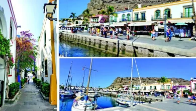 "Scenic view of Mogan, the Little Venice of Canary Islands with boats and colorful buildings."