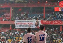 Countless spectators in white jerseys like Kohli