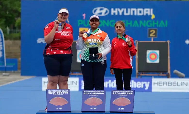 Madhura Dhamangaonkar celebrates winning gold at the Archery World Cup.